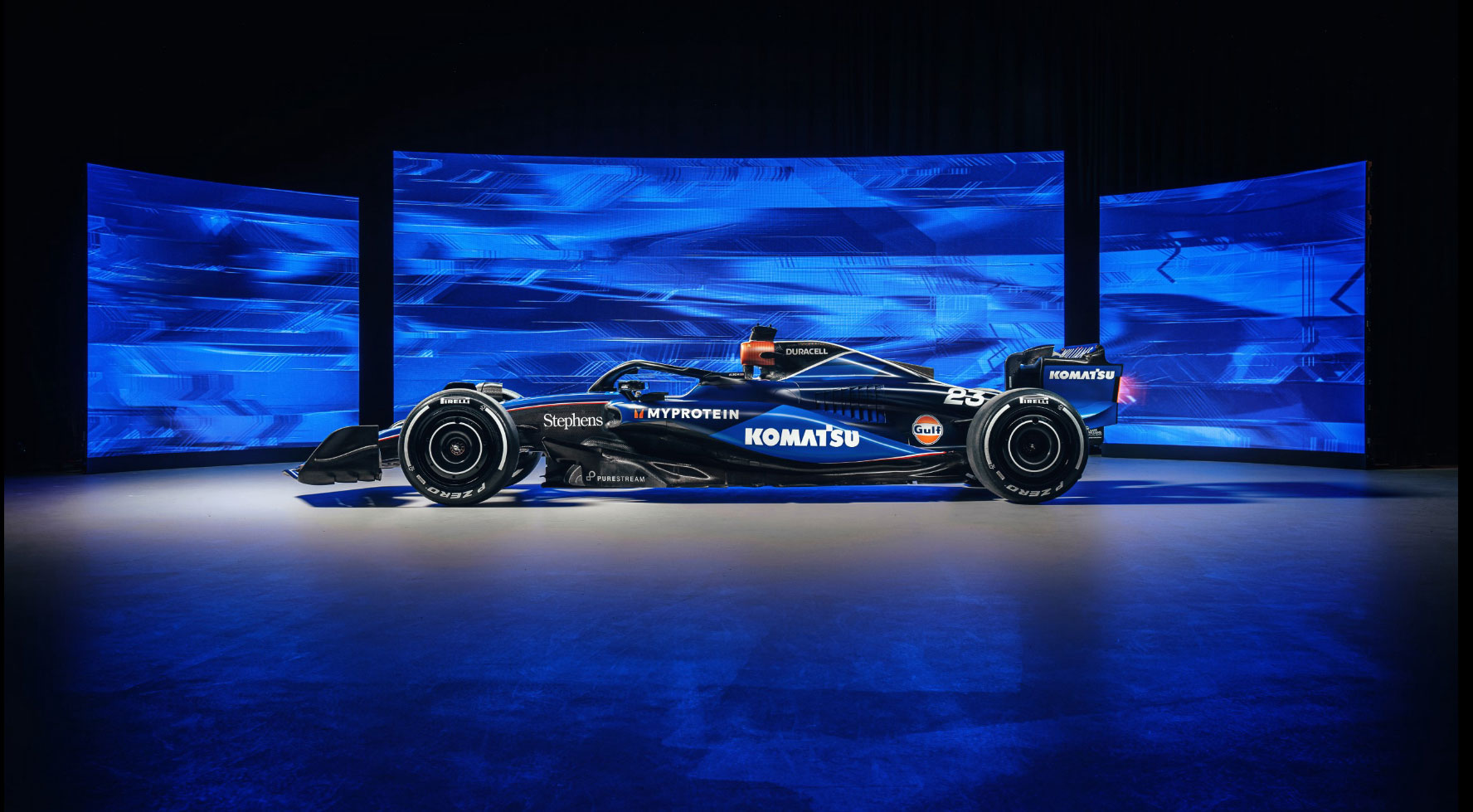 Komatsu’s logo and branding feature prominently on the 2024 Williams Racing livery, as well as the team’s overalls and kit, for the upcoming Formula One season.